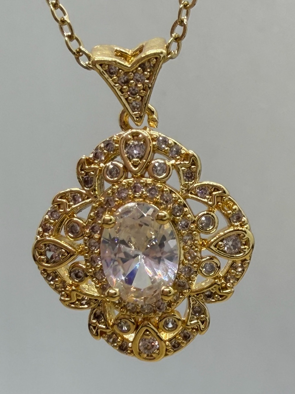 Gold-Tone Filigree Pendant Necklace with Clear Oval Stone